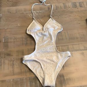 Similar to the style on Julia Fox: Sexy 1 Piece Lace Bathing Suit- Ivory.